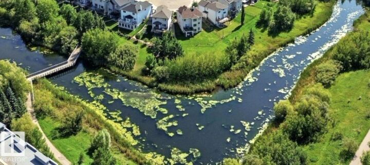 Property Photo:  11449 Ellerslie Road SW 205  AB T6W 1T2 