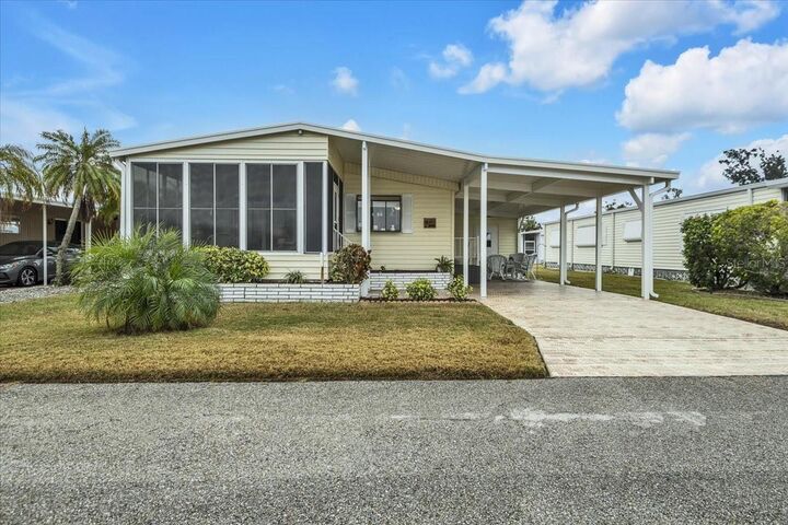 Property Photo:  808 53rd Avenue E 209  FL 34203 