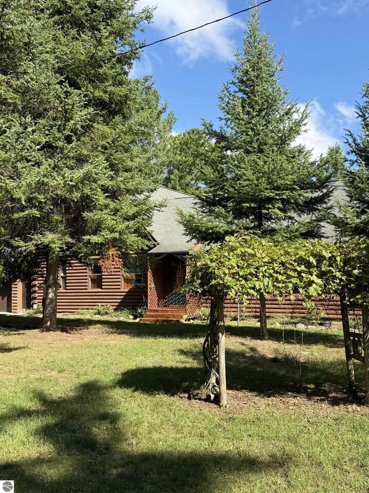 Property Photo:  5048 W Stevenson Lake Road  MI 48632 
