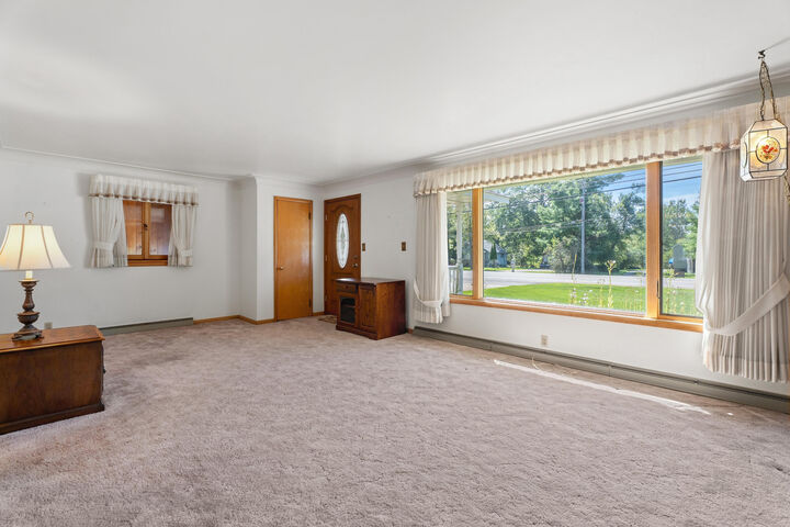 Property Photo:  1432 Long Rapids Road  MI 49707 