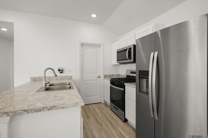 Property Photo:  1206 E Saint Charles St  LA 70737 