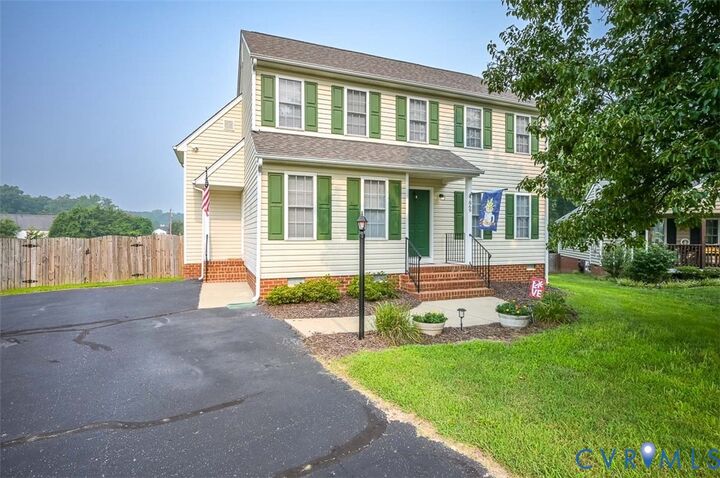 Property Photo: 7869 Silktree Place VA 23111