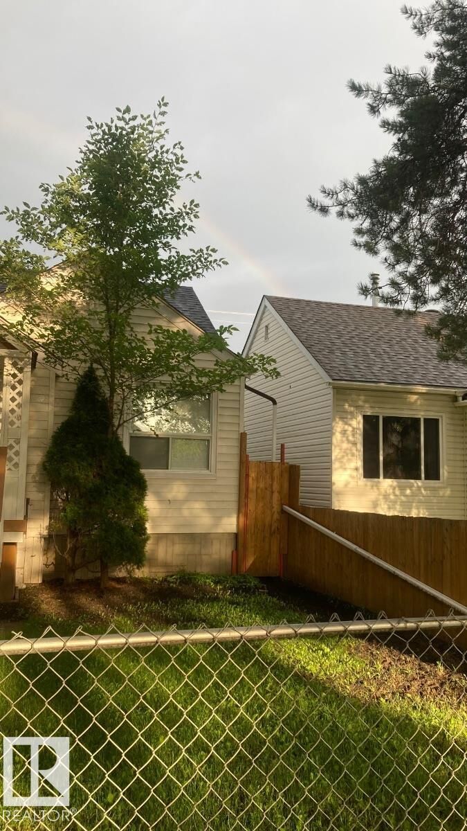Property Photo: 11438 83 Street NW AB T5B 2Y3