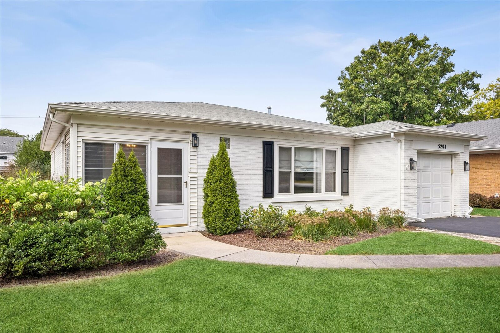Property Photo: 5204 Wolf Road IL 60558