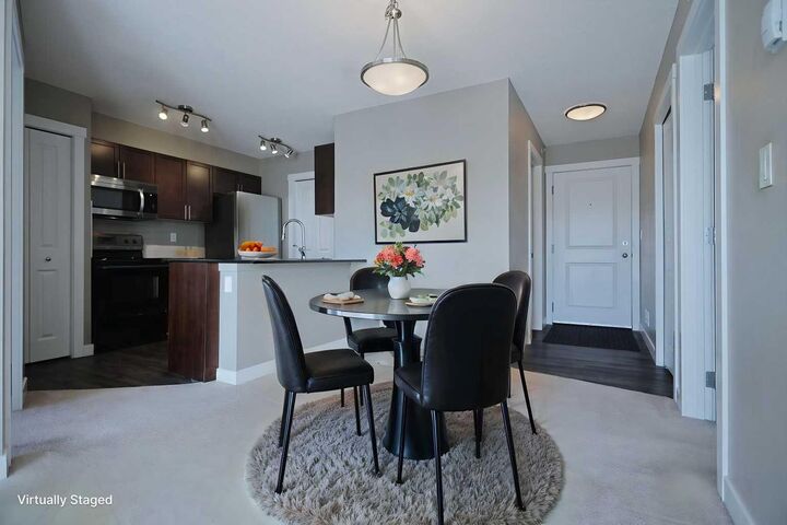 Property Photo: 10 Kincora Glen Park NW 305 AB T3R 1K1
