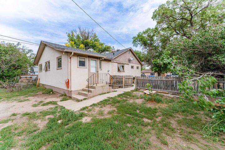 Property Photo:  5220 53 Street  AB T1G 1M4 