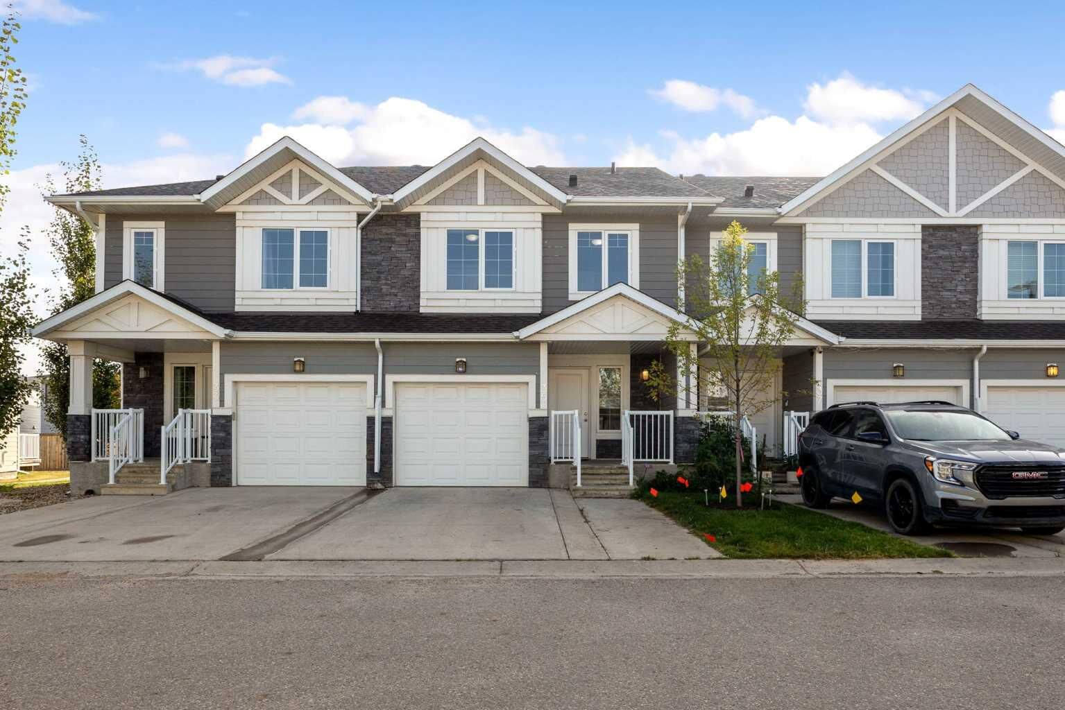 Property Photo: 284 Shalestone Way 35 AB T9K 0V2