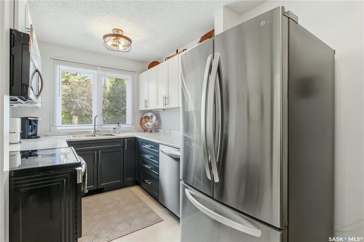 Property Photo:  1128 McKercher Drive 30  SK S7H 4Y7 