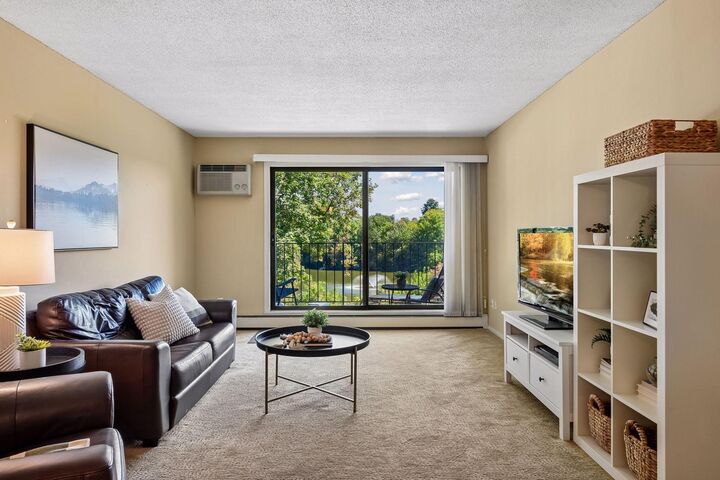 Property Photo:  215 Barry Avenue S 217  MN 55391 