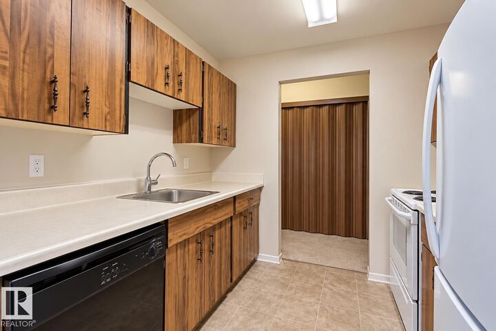 Property Photo:  18204 93 Avenue NW 402  AB T5T 2V2 