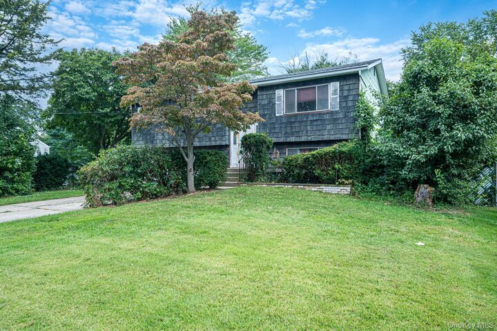 Property Photo:  575 Freeman Avenue  NY 11717 