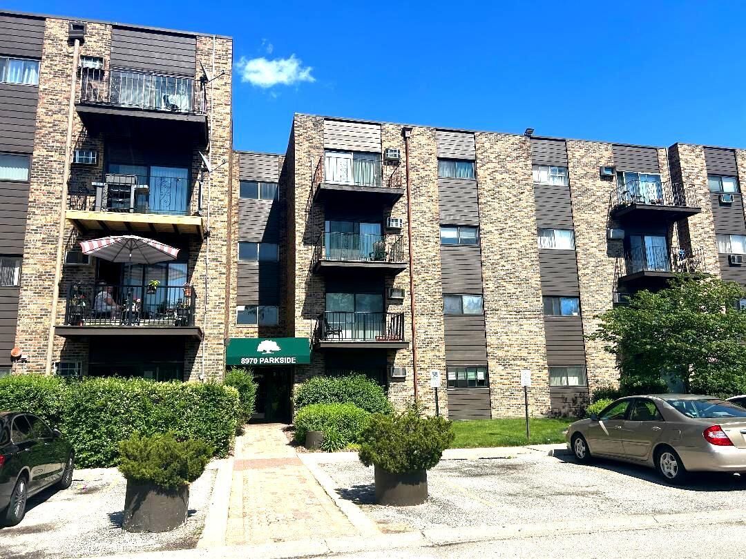 Property Photo: 8970 N Parkside Avenue 416 IL 60016