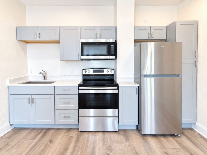 Property Photo: 8 Kenwwod St 7 MA 02124