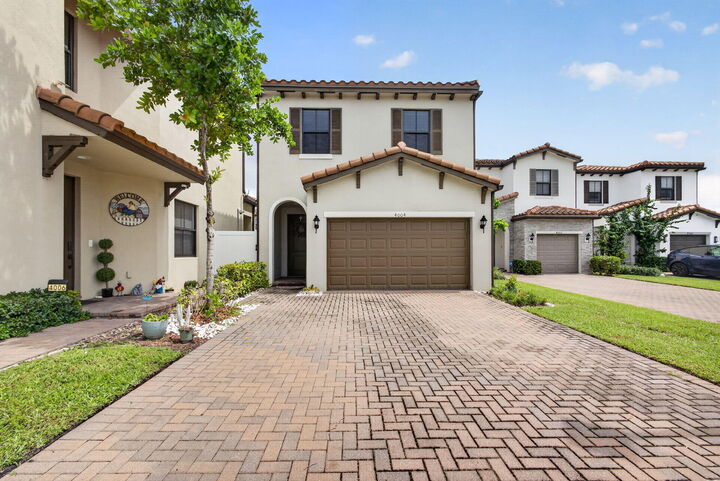 Property Photo: 4004 Screw Pine Cove FL 33410