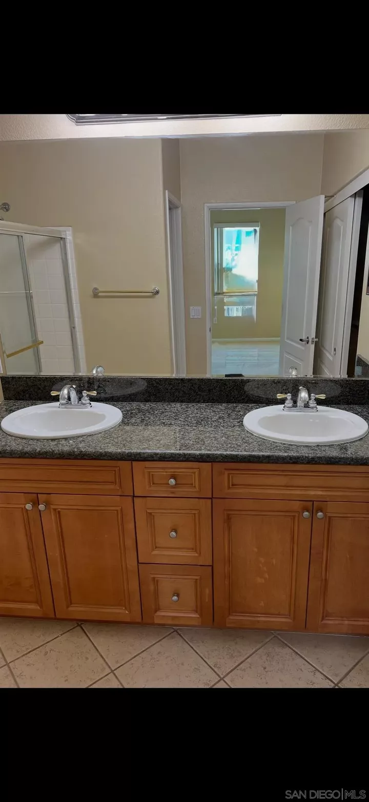 Property Photo:  10910 Serafina Ln 54  CA 92128 