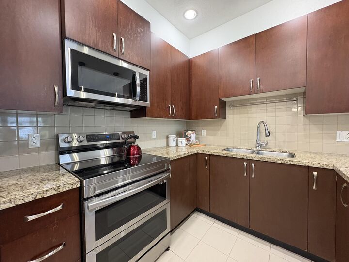 Property Photo:  10237 133 Street 112  BC V3T 0C6 