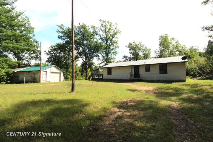 Property Photo:  6595 Wickert Road  MI 48739 