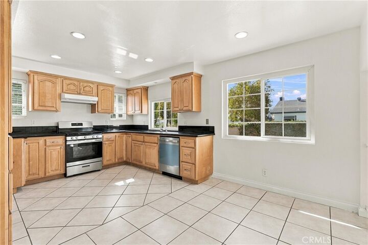 Property Photo:  6912 Tahiti  CA 90630 