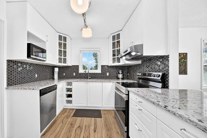 Property Photo:  7171 Coach Hill Road SW 2906  AB T3H 3R7 