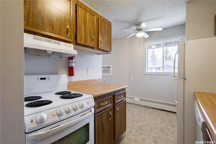 Property Photo:  35 Alport Crescent 206  SK S4R 7X2 