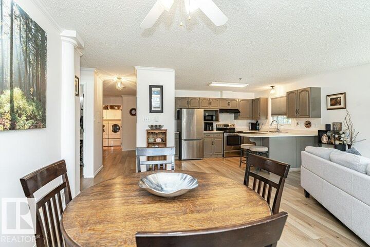 Property Photo:  10610 76 Street NW 211  AB T6A 3Y9 