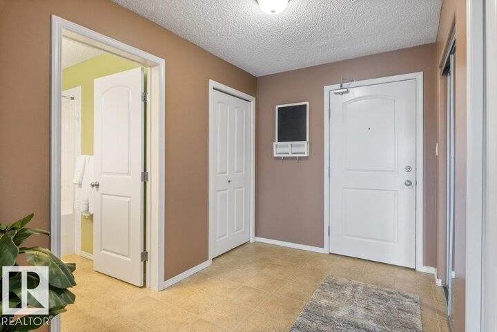 Property Photo:  9910 107 Street 307  AB T8R 0A3 