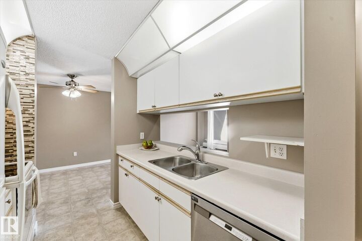Property Photo:  2508 50 Street NW 104  AB T6L 6X9 
