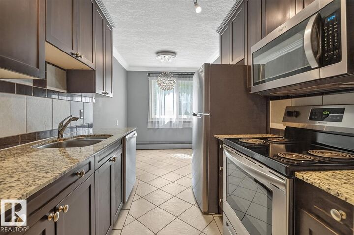 Property Photo:  10625 83 Avenue NW 402  AB T6E 2E3 