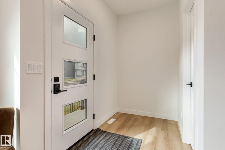 Property Photo:  202 Starling Way  AB T8L 0X9 