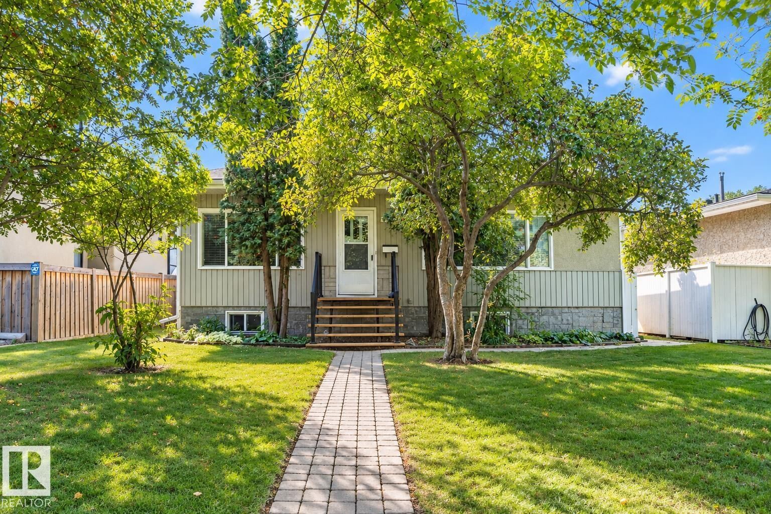 Property Photo:  8743 Strathearn Drive NW  AB T6C 4C8 