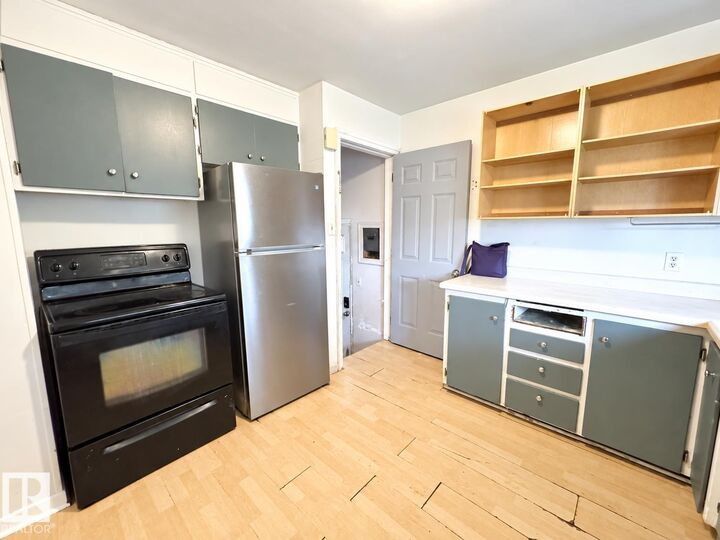 Property Photo:  12113 127 Street NW  AB T5L 0Z6 