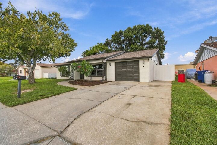 Property Photo:  7215 Robstown Drive  FL 34668 