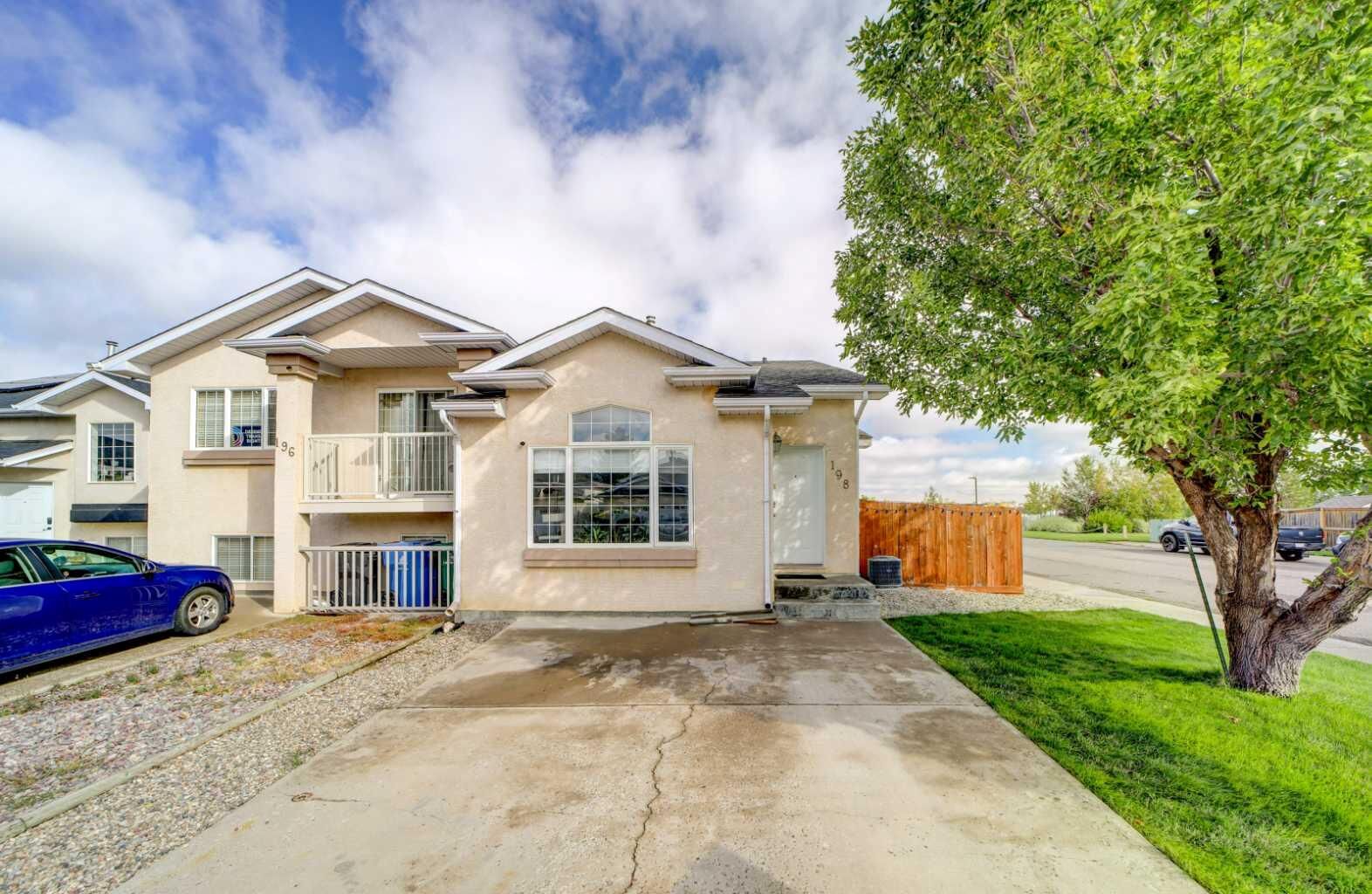 Property Photo:  198 Cougar Way N  AB T1H 6P4 