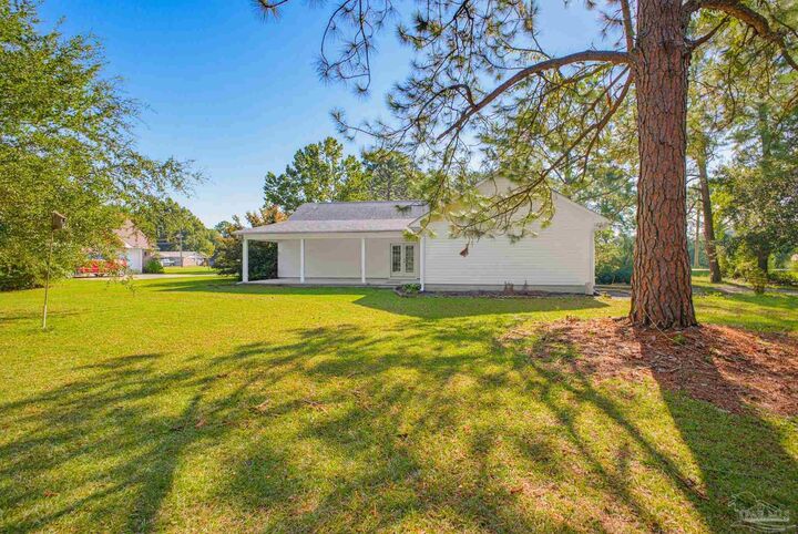 Property Photo:  5647 Tilubo Ln  FL 32571 