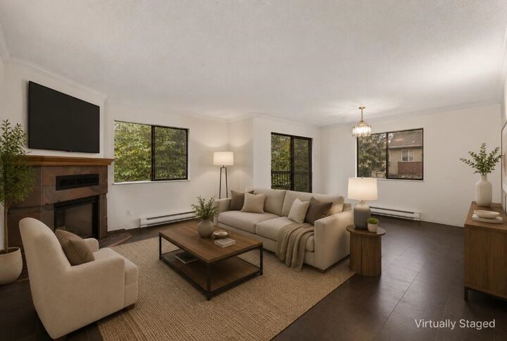 Property Photo:  7165 133 Street 204  BC V3W 7Z6 