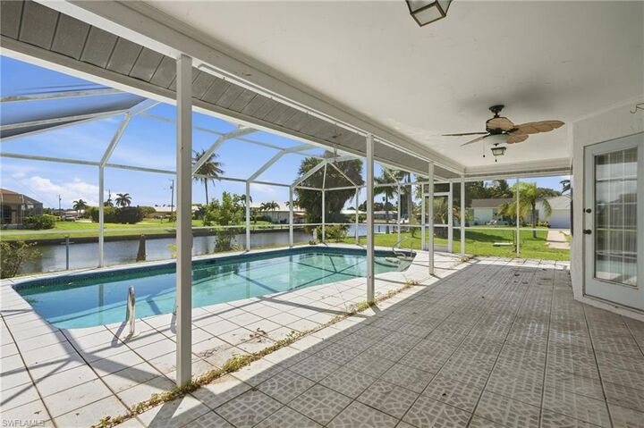 Property Photo:  202 SE 37th Ter  FL 33904 