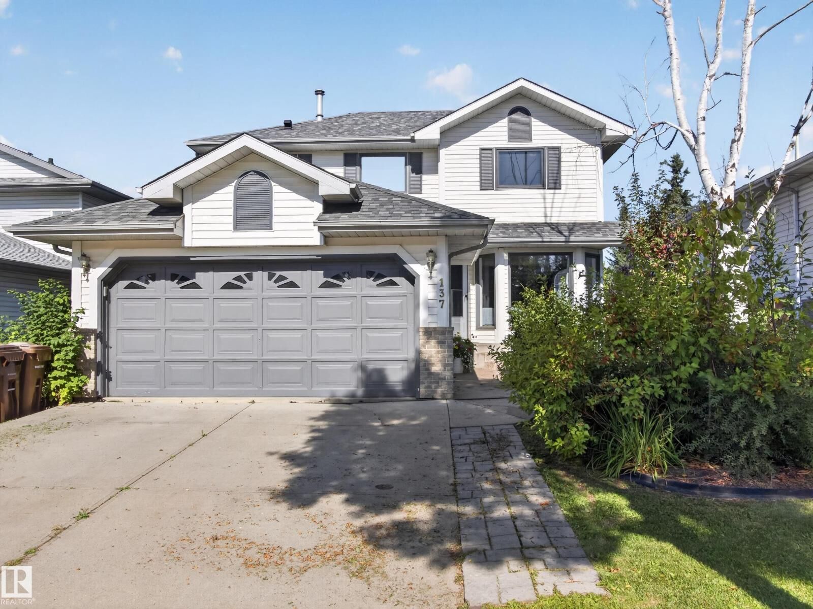 Property Photo:  137 Deer Ridge Dr  AB T8N 6G7 