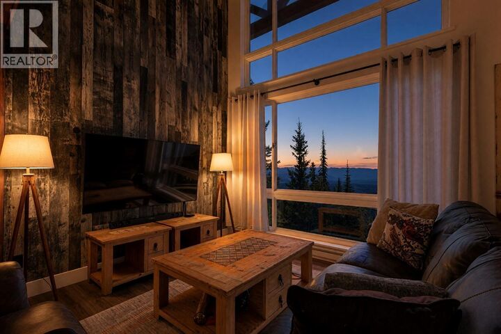 Property Photo:  5877 Snow Pines Crescent C  BC V1W 2L8 
