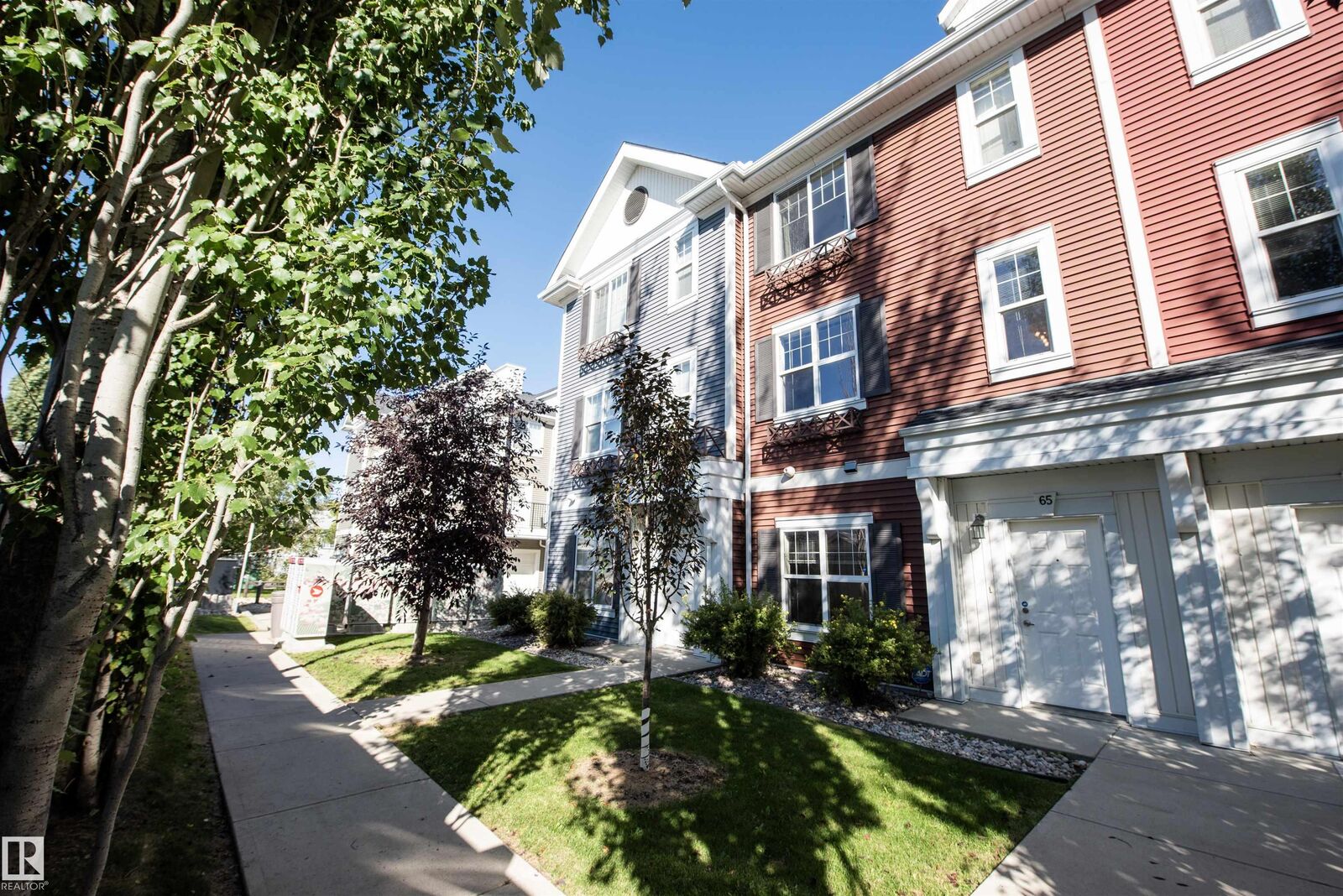 Property Photo:  8315 180 Avenue NW 65  AB T5Z 0J2 