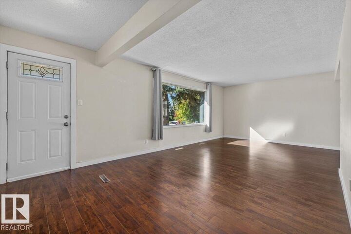 Property Photo:  11516 44 Avenue NW  AB T6J 0Z5 