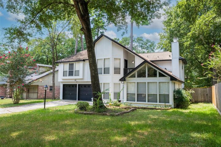 Property Photo:  31 N Drifting Leaf Court  TX 77380 