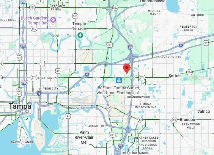 Property Photo:  10202 Bryan Road  FL 33610 
