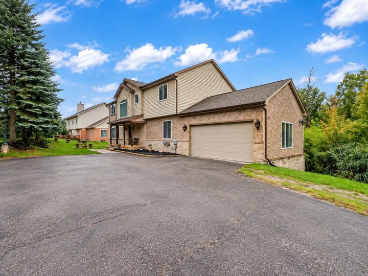 Property Photo:  7295 W Maple Road  MI 48322-2706 