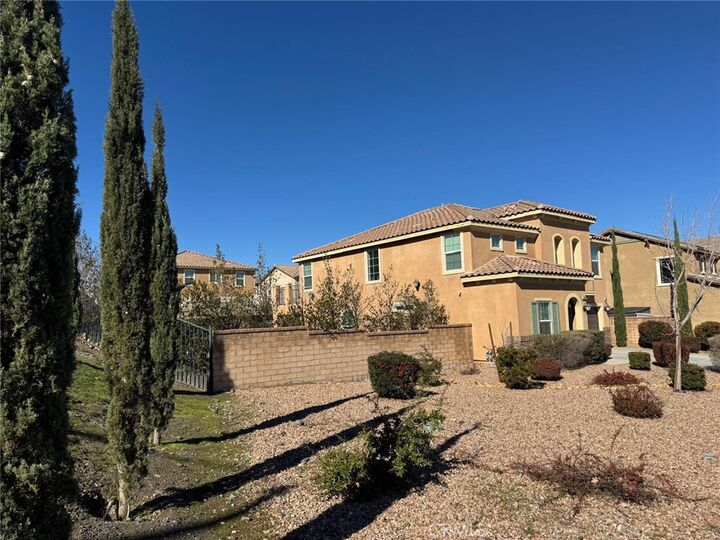 Property Photo: 37507 Citron Place CA 93551