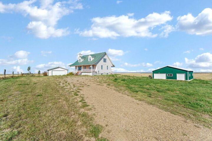 Property Photo:  10302 Black &Amp White Trail  AB T1B 0L1 