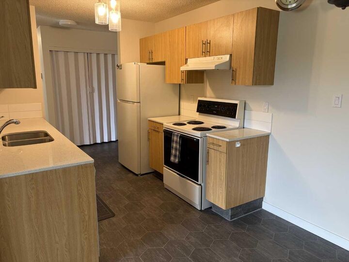 Property Photo:  85 Foxbend Crescent N 303  AB T1H 5T4 