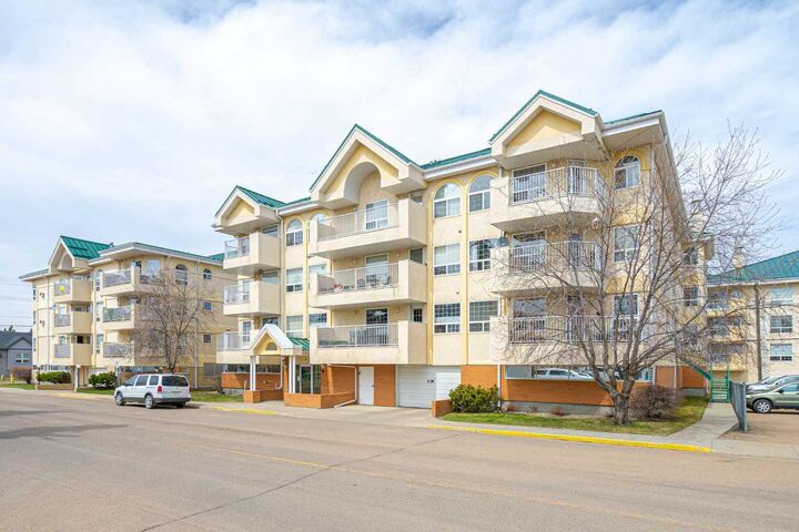 Property Photo:  5116 49 Street 105  AB T9V 0K4 