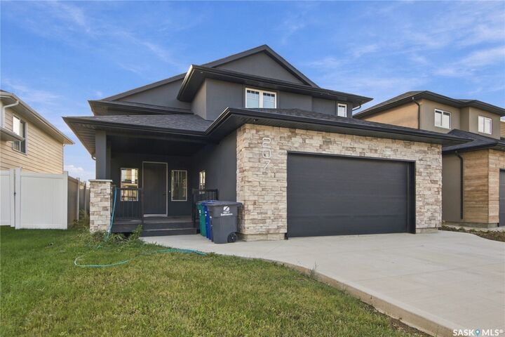 Property Photo:  207 Greyeyes-Steele Way  SK S7V 0M6 