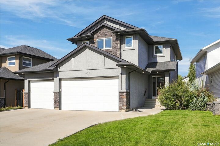 Property Photo:  411 Hastings Crescent  SK S7V 0C7 