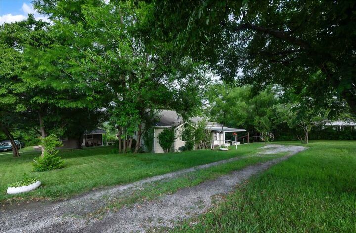 Property Photo:  411 Harmony Rd  PA 15005 